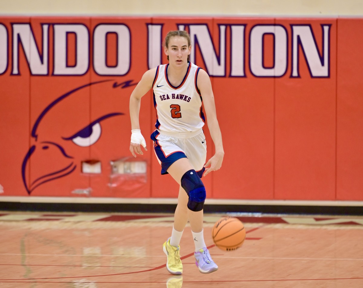 Even at 6-3, Redondo Union senior Ella Zimmerman brings the ball up court. 